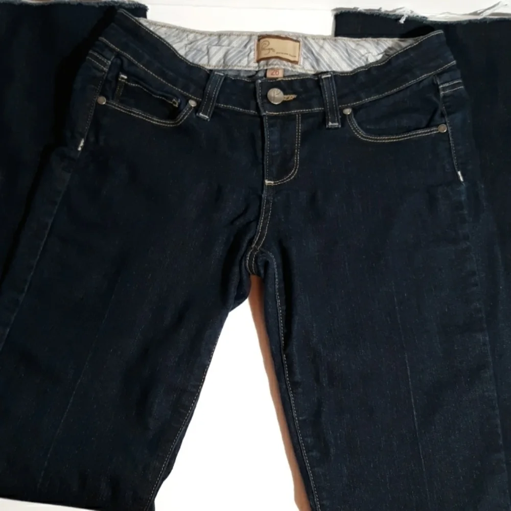 Paige 26 raw hem jeans boot cut